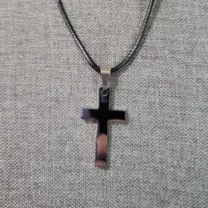 FaithHeart Silver Cross Necklace on Leather Cord with Push/Pull Style Closure.